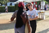 Image of two people talking and at Mladifest 2024.