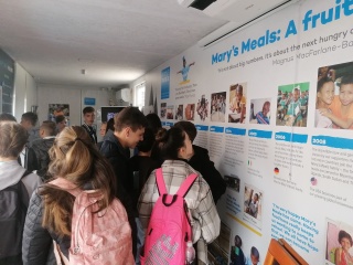 People inside the Blue Container