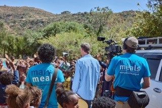 Crew filming in a programme country